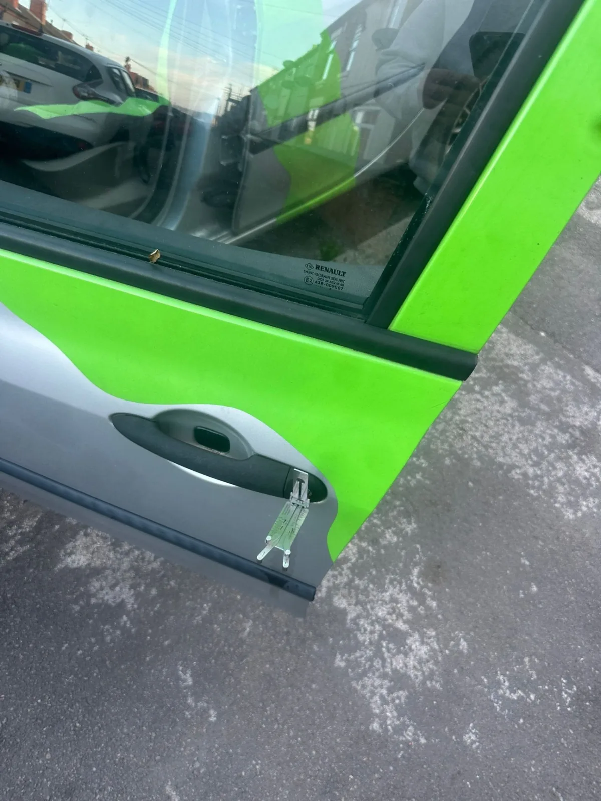 Non-destructive lockout kit unlocking a green work van door — SRM Auto Access